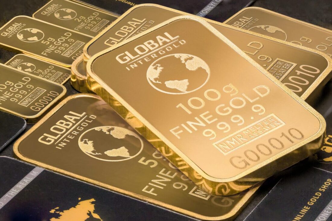 muitas barras de ouro escrito "global intergold"